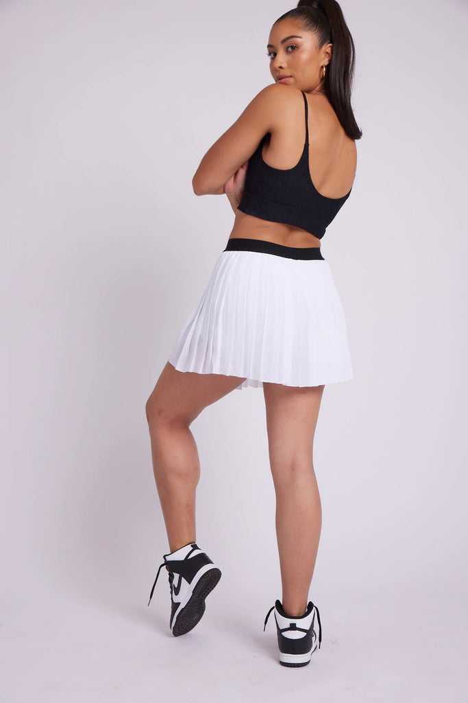 ONZIE Pleated Tennis Skirt White | Shop Online at SPORTLES.com